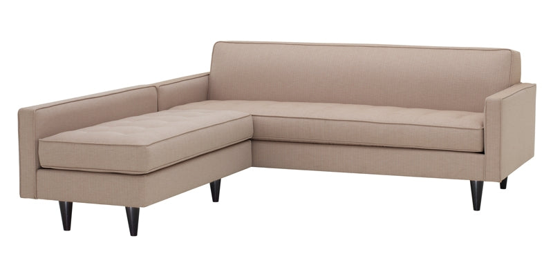 Beige sectional sofa on a white background