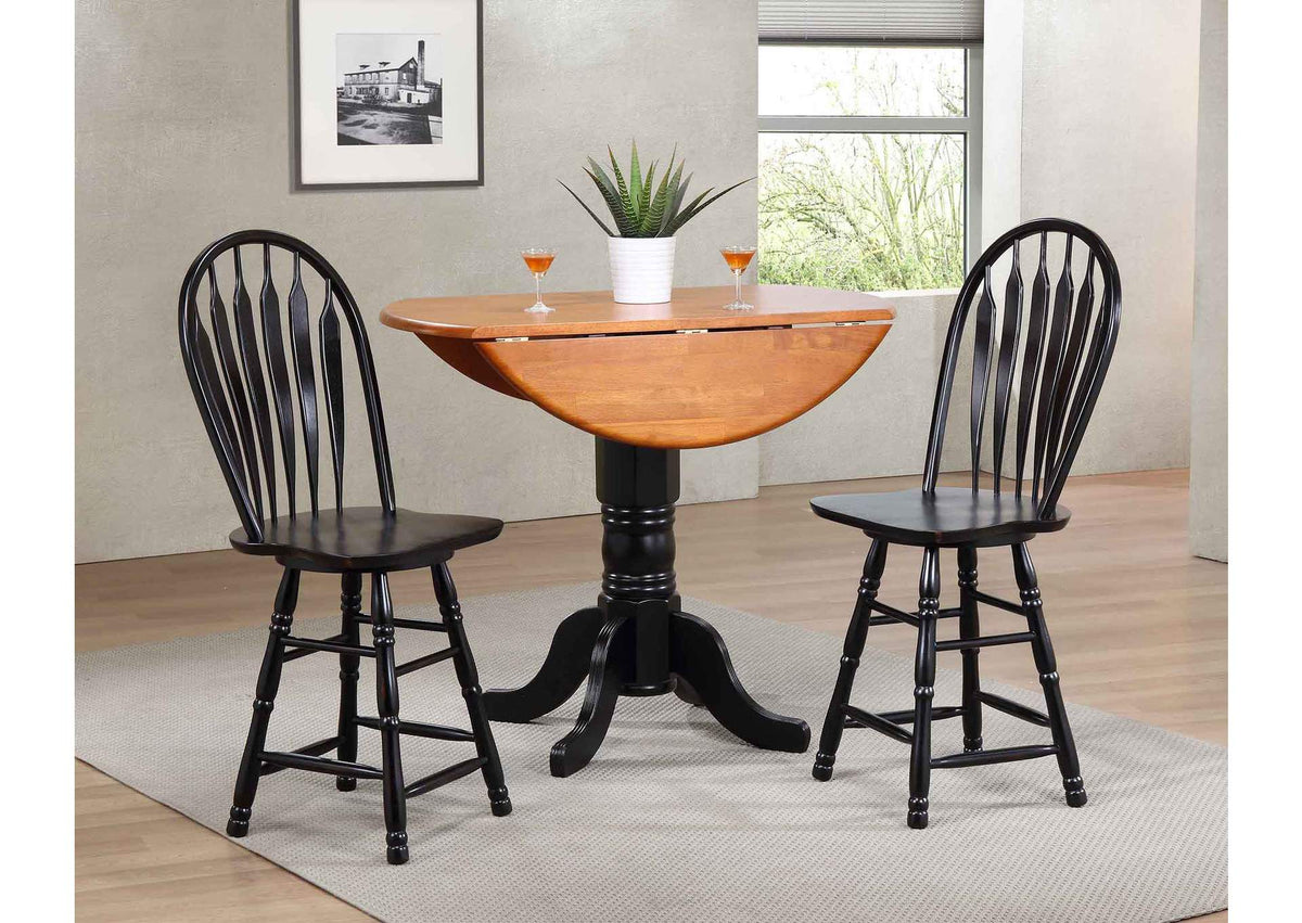 DLU-TPD4242CB-BCH Sunset Trading Round Drop Leaf Pub Table | Antique Black with Cherry Finish Top