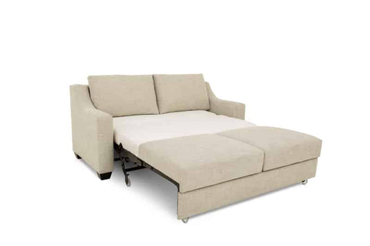 Beige sectional sofa with pull-out bed on a white background