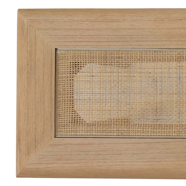 Wooden cabinet door with rattan panel on a white background