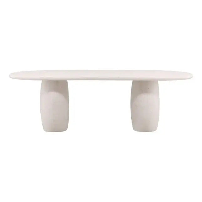 White ceramic table with three rounded legs on a white background