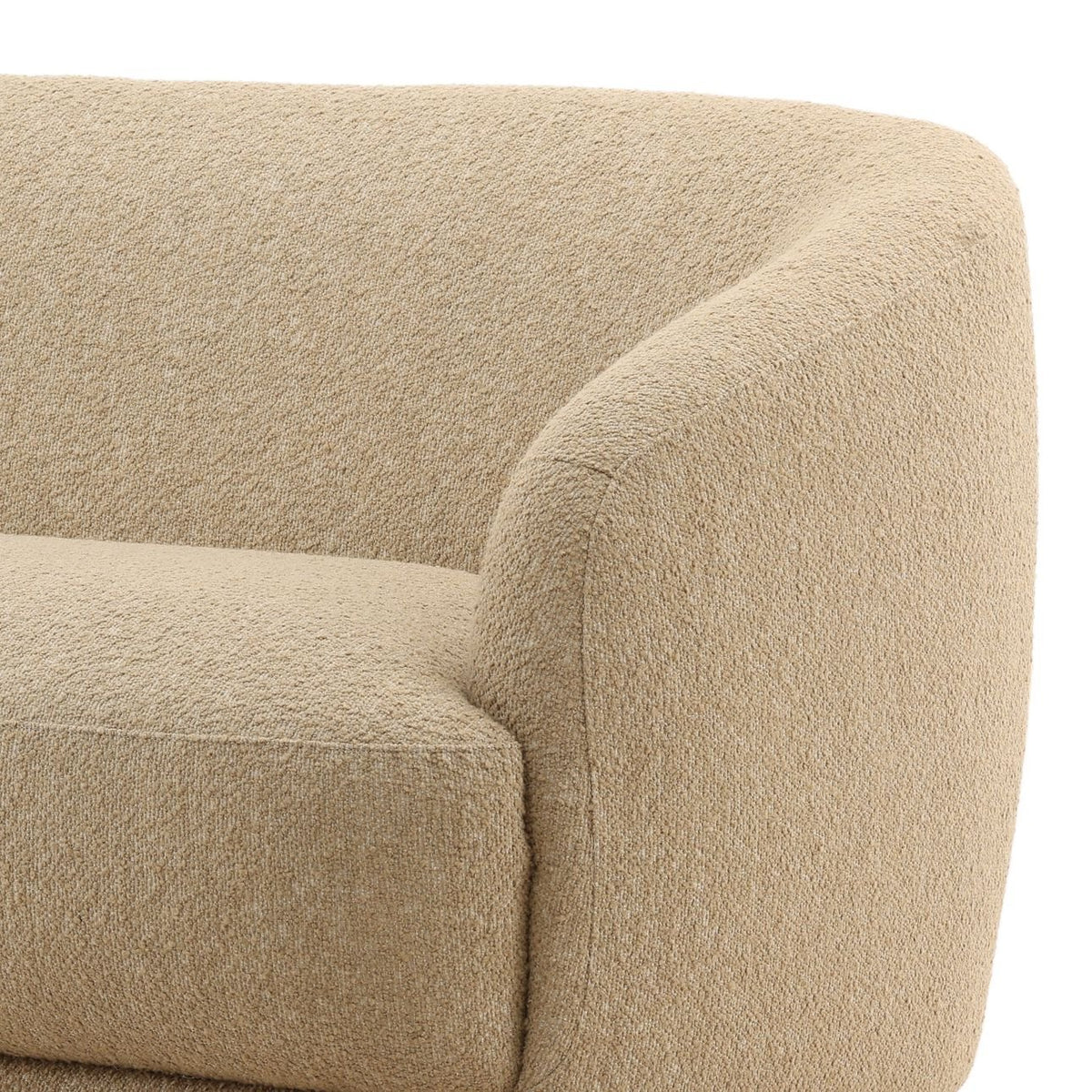 Close-up of a beige textured armchair corner on a white background