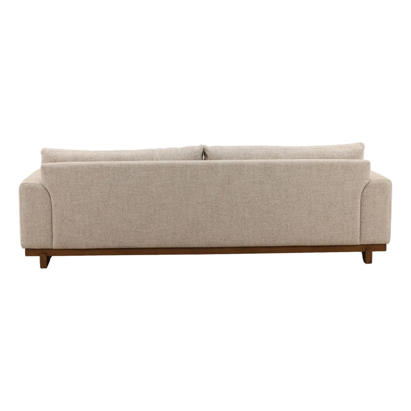 Beige sofa with wooden legs on a white background
