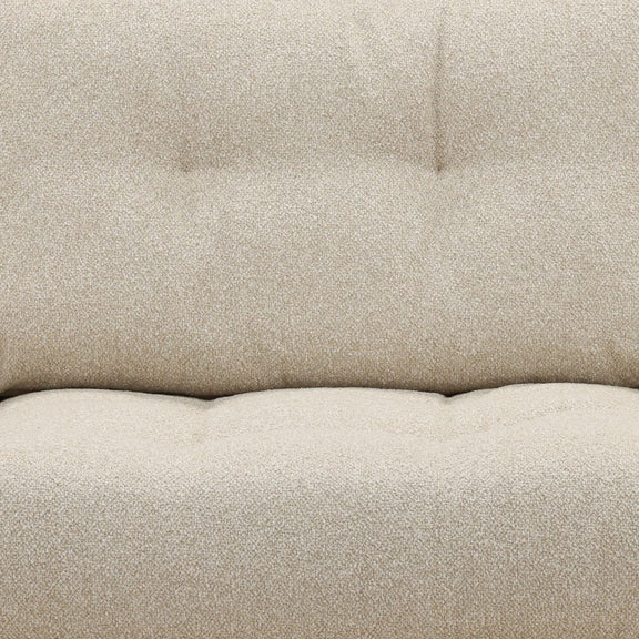 Close-up of a textured beige fabric surface