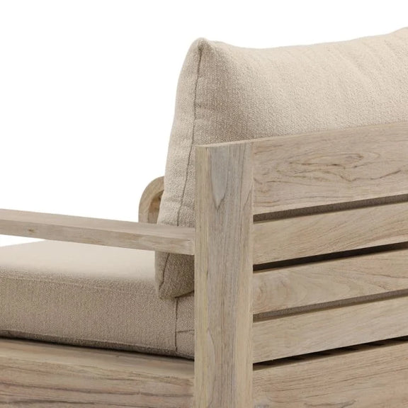 Wooden outdoor chair with beige cushions on a white background