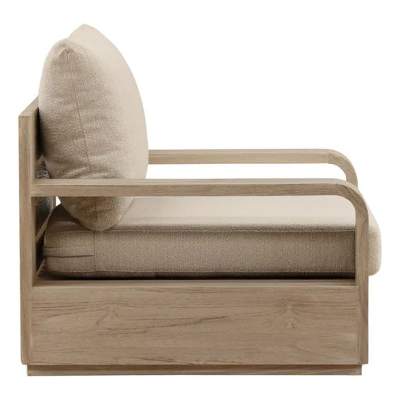 Beige armchair with wooden frame and cushion on a white background