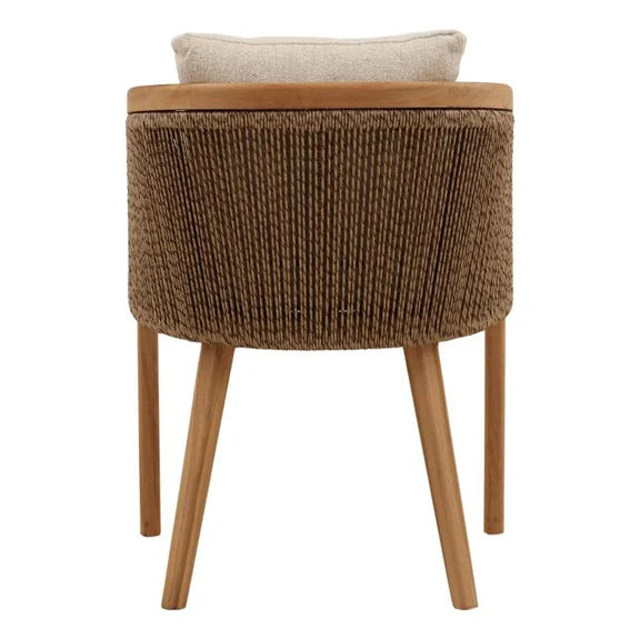 Wicker stool with wooden legs and a cushion on a white background