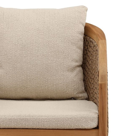 Close-up of a beige cushion on a wooden chair with a white background