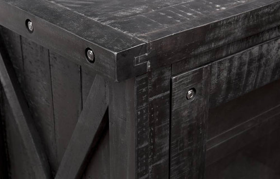 Dark wooden cabinet with metal accents on a dark background
