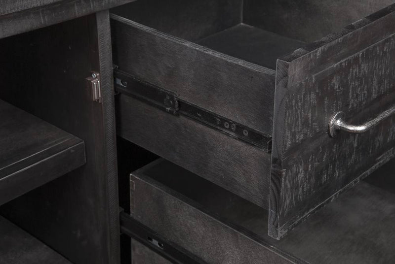 Dark wooden drawers with metal handles in a close-up shot