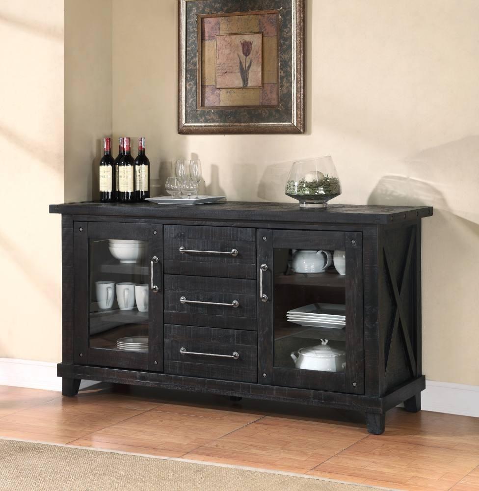 Dark wooden sideboard with glass doors and metal handles in a room setting.