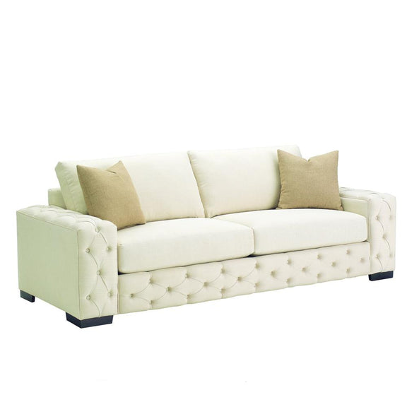 White sofa with beige cushions on a white background