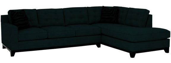 Black sectional sofa on a white background