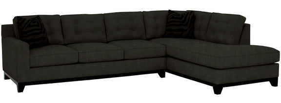 Black sectional sofa on a white background