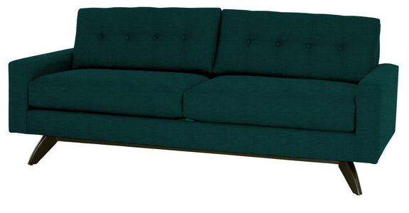 Teal sofa with buttoned backrest on a white background