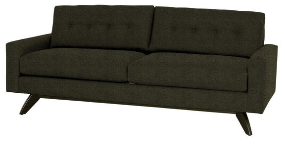 Dark gray sofa with buttoned backrest on a white background