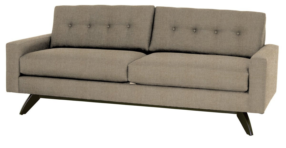Gray sofa with buttoned backrest on a white background